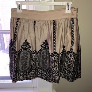 Francesca’s beige skirt with black pattern